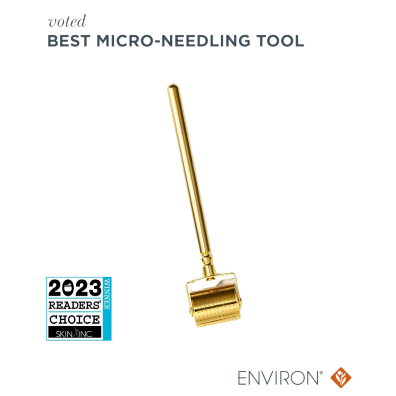 Environ Gold Cosmetic Roll-CIT® 0.2 mm micro-needling device with gold-tipped needles for skincare treatment.