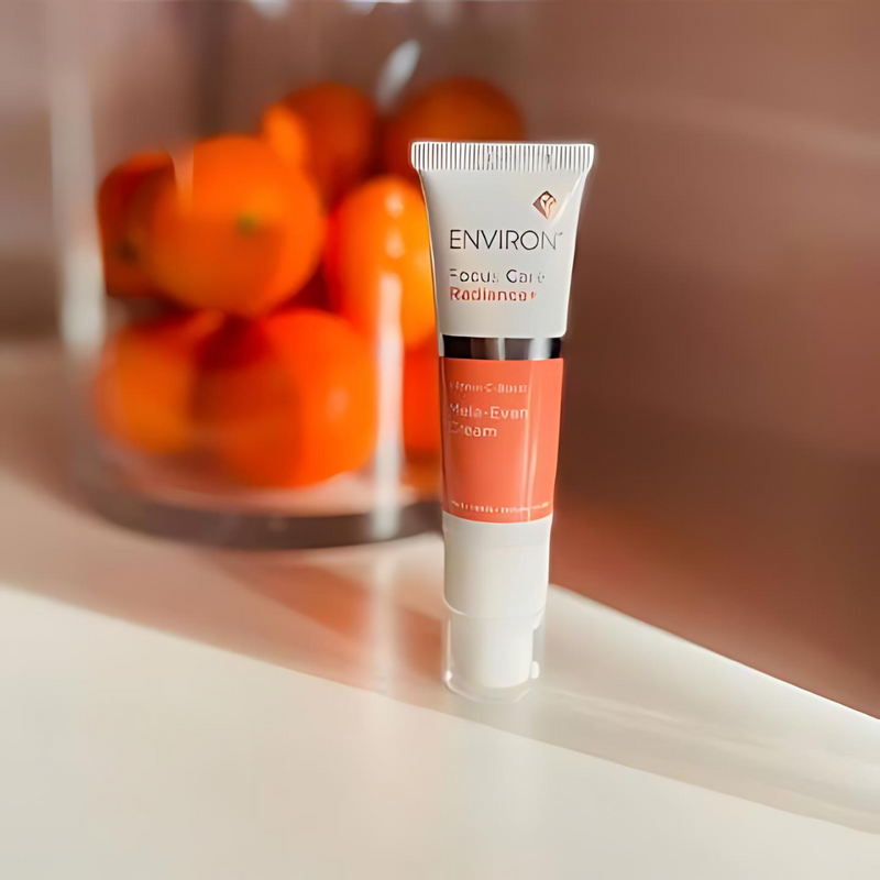 Environ Intense C-Boost Mela-Even Cream jar with white and orange packaging, showing the product label and lid.